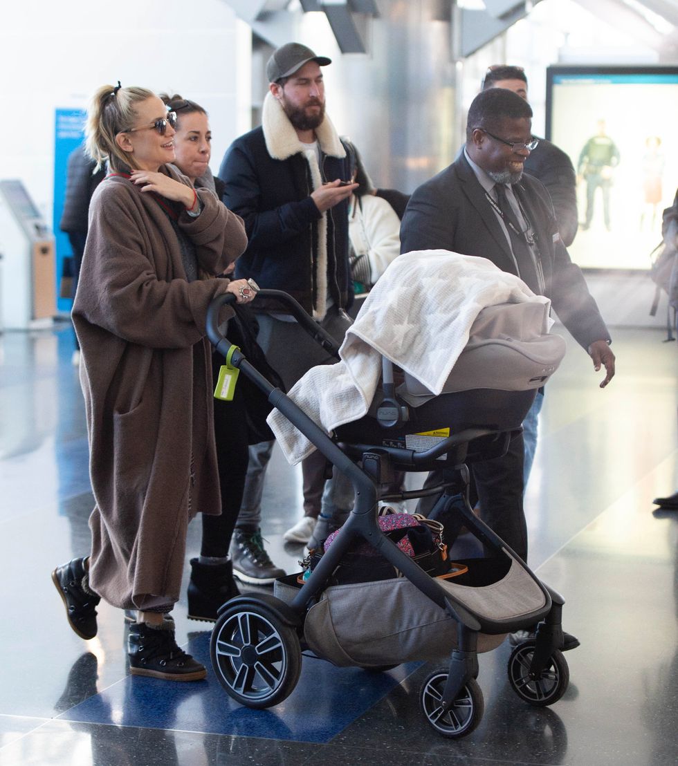 EXCLUSIVE: Kate Hudson and Danny Fujikawa arrive at JFK airport in New York City.