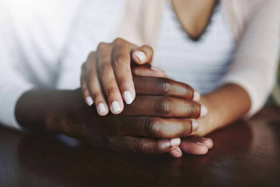 African American couple holding hands