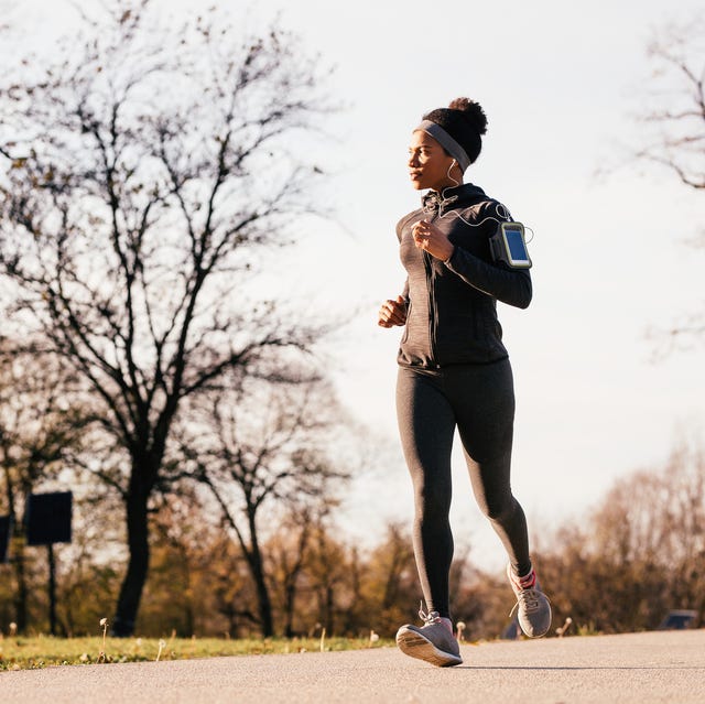 https://hips.hearstapps.com/hmg-prod/images/african-american-female-athlete-jogging-in-nature-royalty-free-image-1617048446.?crop=0.668xw:1.00xh;0.332xw,0&resize=640:*
