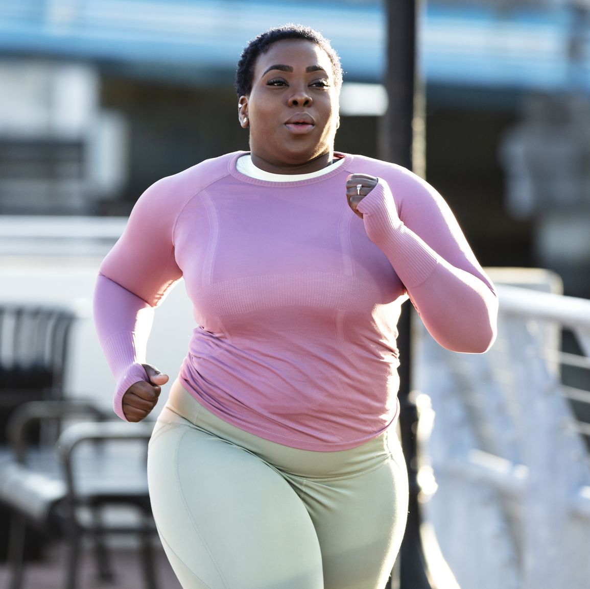 african american woman with large build, running in city