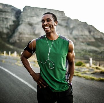 african athlete smiling positively after a good training session