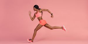 African female runner sprinting