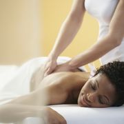African woman receiving massage
