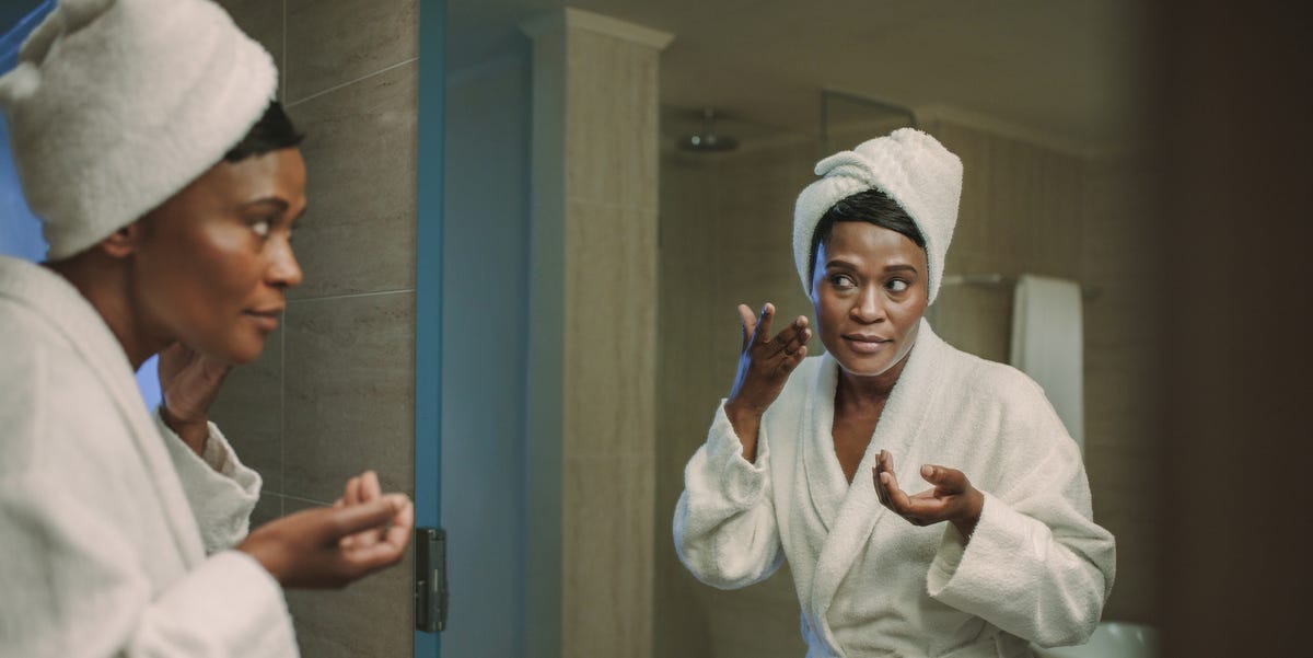 Woman in bathroom What is retinol