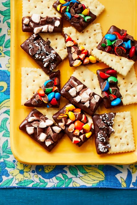 concession stand crackers with candy on yellow plate