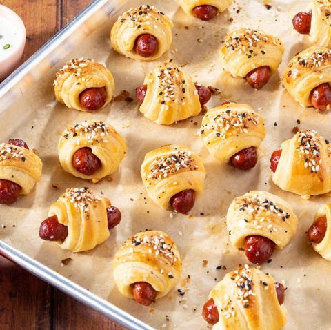 pigs in a blanket with seeds on sheet pan