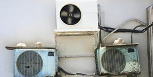 Air conditioning units on the side of a building.