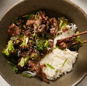 air fryer beef and broccoli in a bowl with white rice