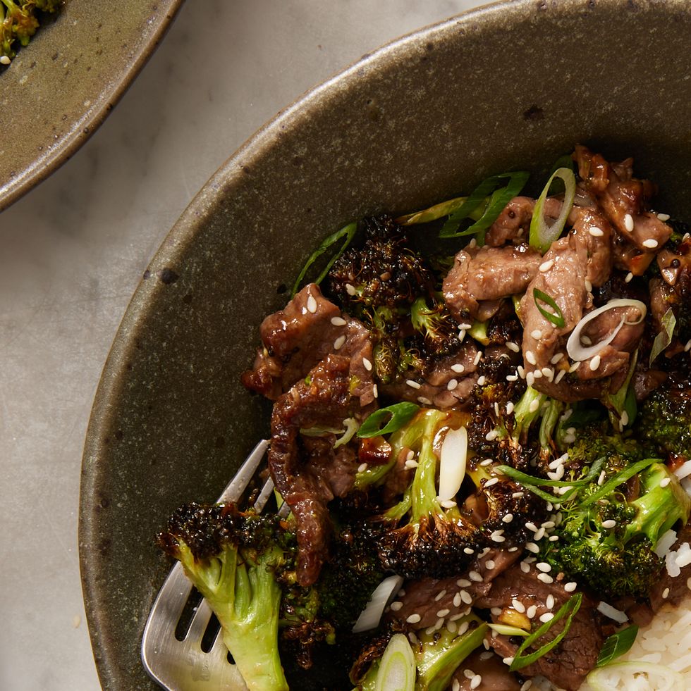 air fryer beef and broccoli in a bowl with white rice
