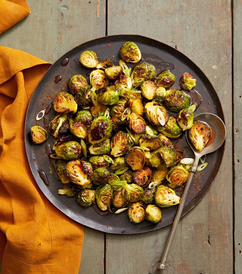roasted brussels sprouts on a dark plate