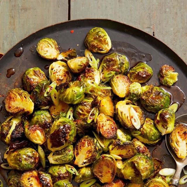 a serving plate with air fried brussels sprout for thanksgiving