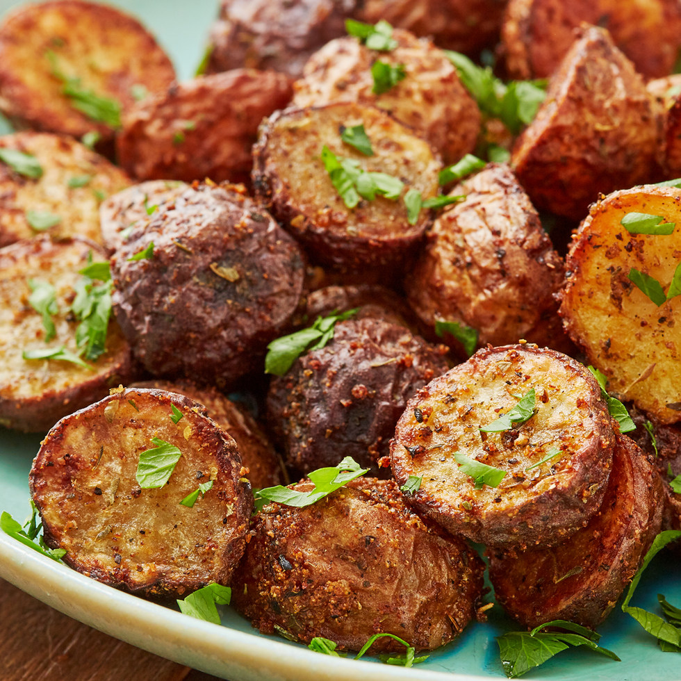 air fryer potatoes topped with herbs