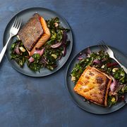 air fryer salmon and swiss chard on a blue background
