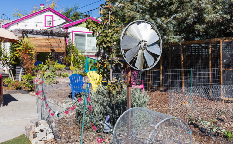 Wheel, Tree, Automotive wheel system, Plant, Rural area, Garden, Flower, Architecture, Yard, Auto part, 