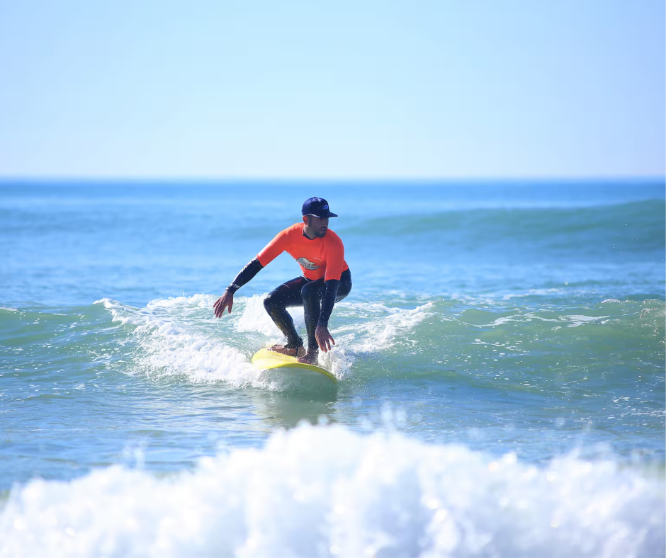 a person surfing on a wave