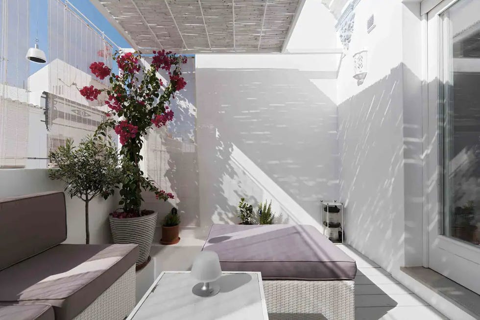 a room with a table and chairs