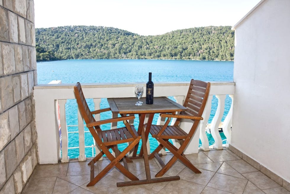 a table and chairs on a patio