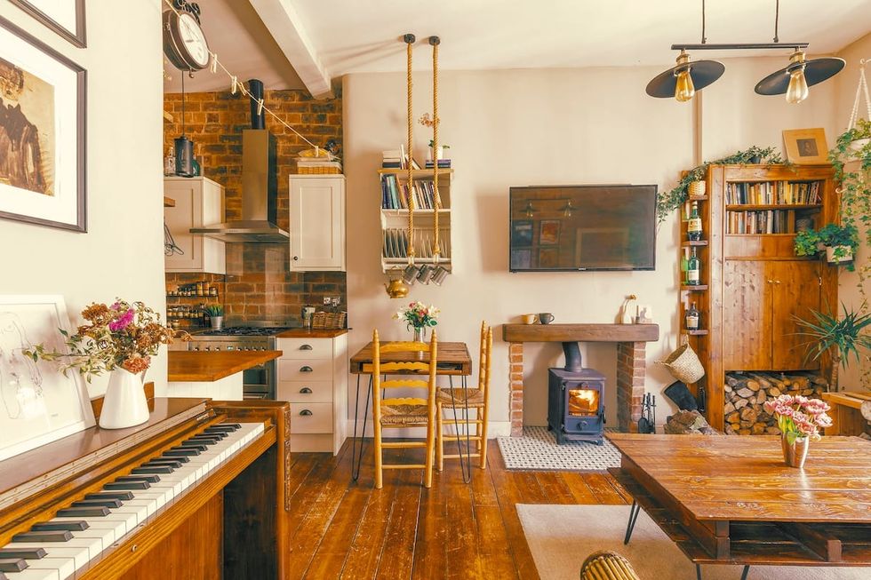 a living room with a piano