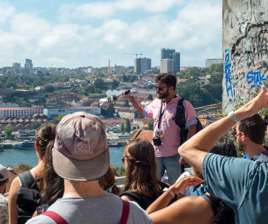 tour guide presenting to a group near a scenic view