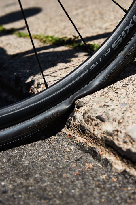 bike tire hitting a curb