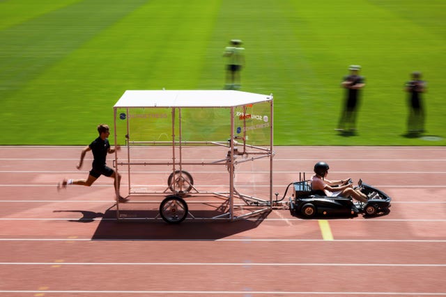 runner behind airshield on track