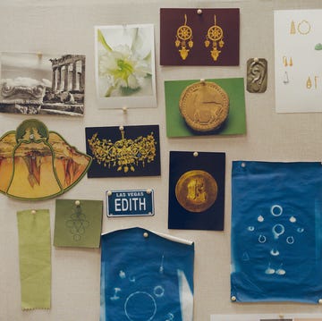 Prounis Jewelry inspiration collage a wall with drawings on it