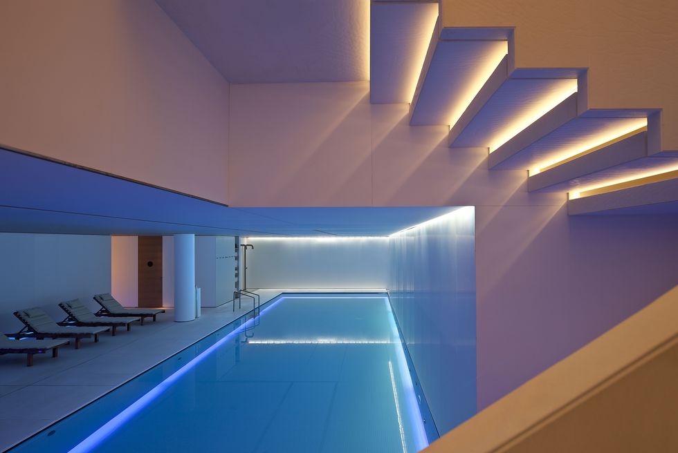 Blue, Ceiling, Architecture, Light, Swimming pool, Lighting, Property, Interior design, Room, Building, 