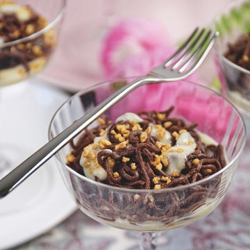 a glass of ice cream with a fork