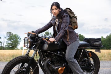 alaqua cox as maya lopez sitting on a motorbike, echo