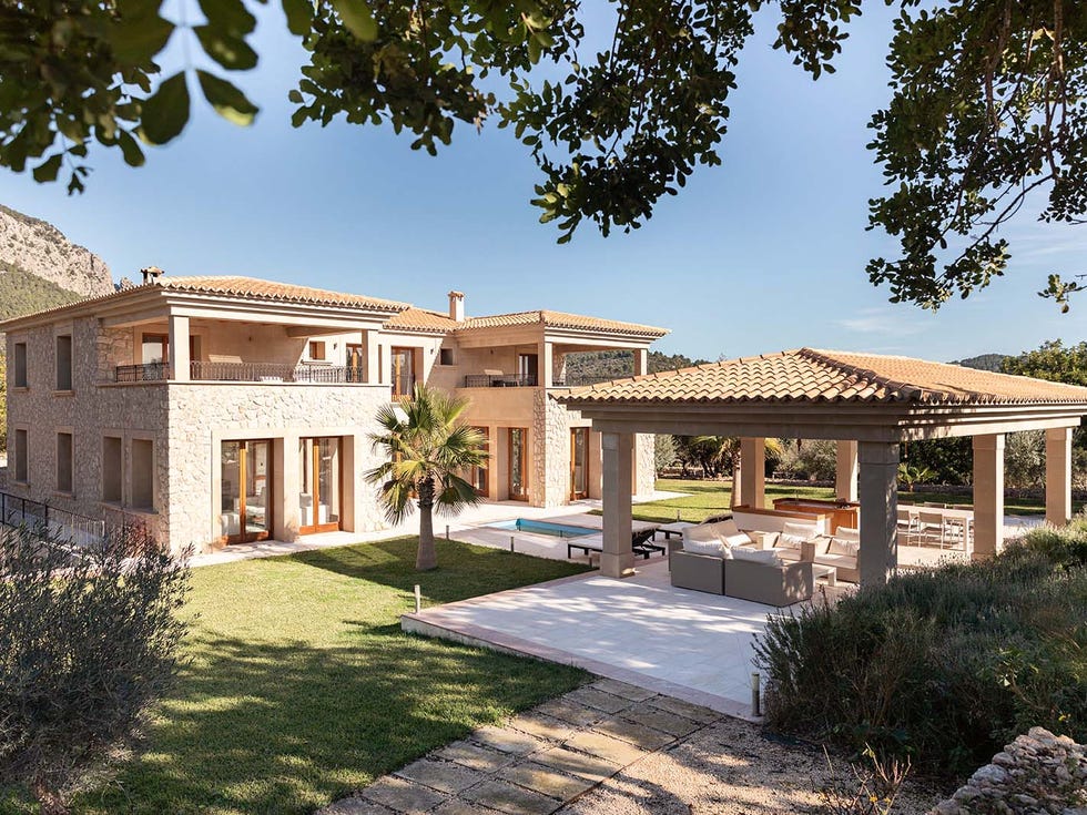 modern villa with outdoor living spaces and swimming pool