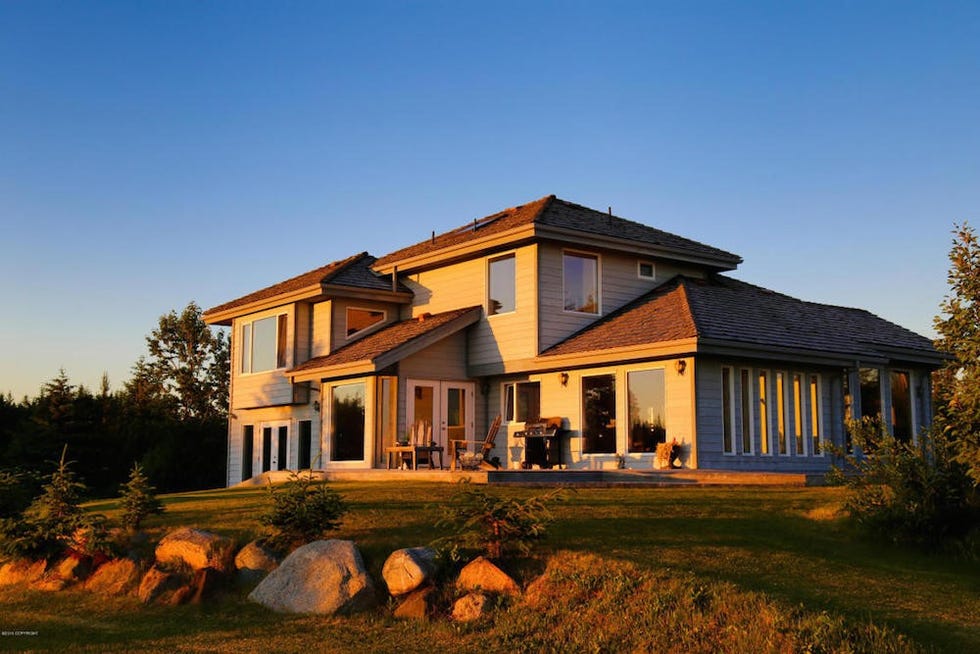 Plant, House, Property, Residential area, Home, Real estate, Facade, Building, Land lot, Roof, 