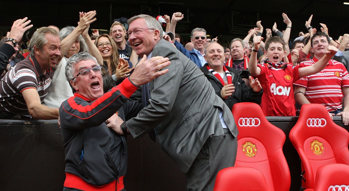 manchester, england   may 08  sir alex ferguson of manchester united r and kitman albert morgan celebrate at final whistle of the barclays premier league match between manchester united and chelsea at old trafford on may 8, 2011 in manchester, england  photo by john petersmanchester united via getty images