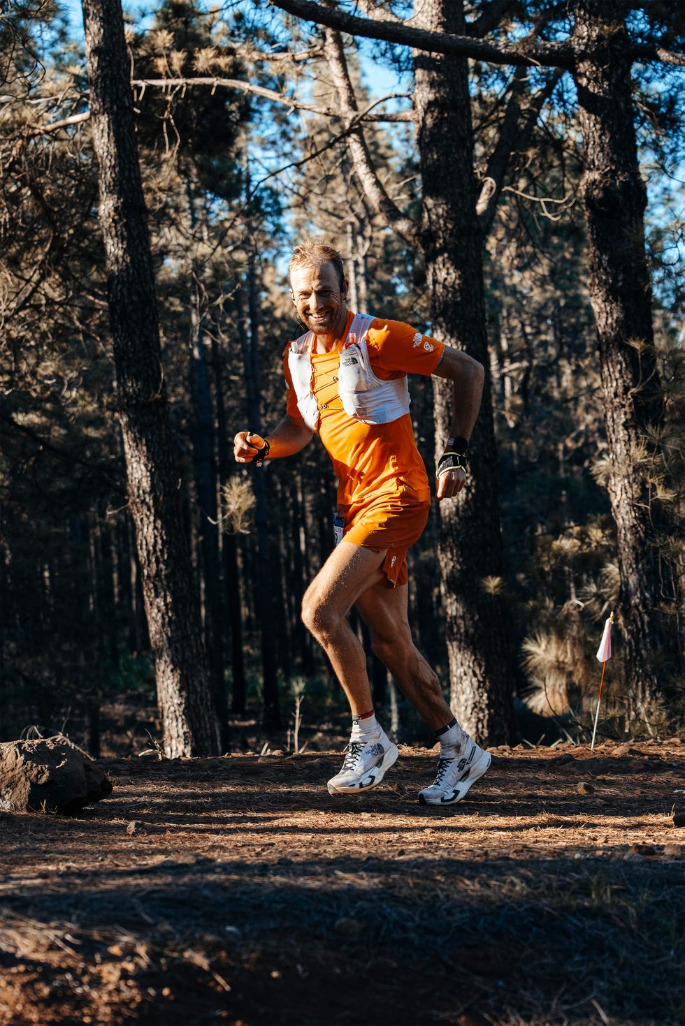a trail runner looking happy