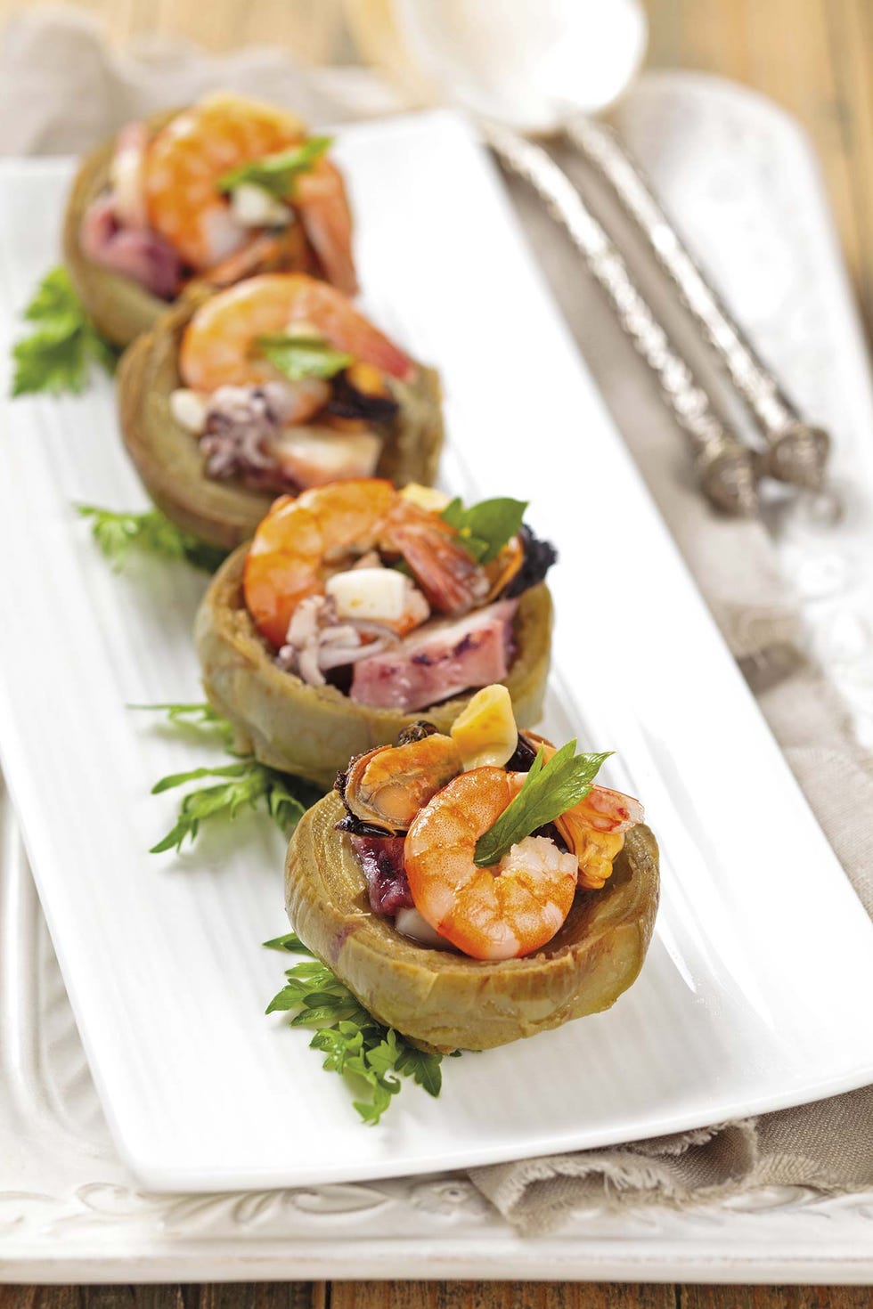 alcachofas rellenas de pulpo y marisco