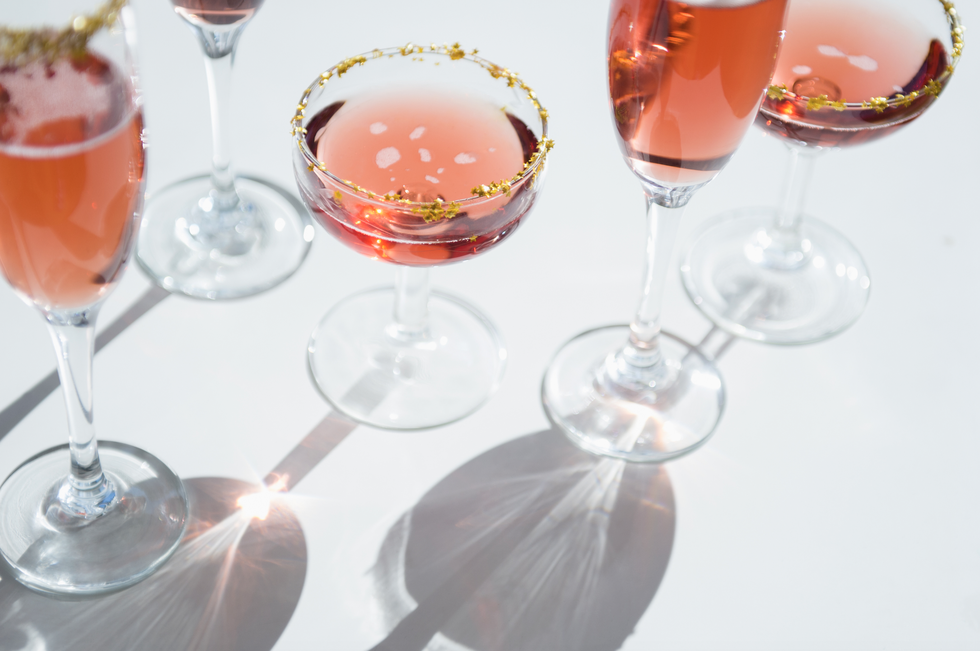 rose wine and cocktails on a white background