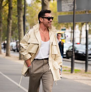 alex badia wearing a white top, beige jacket, brown pants and black sunglasses, outside courreges, during the womenswear spring summer 2024 as part of paris fashion week on september 27, 2023 in paris, france in a roundup of the best gifts for men who have everything 2024