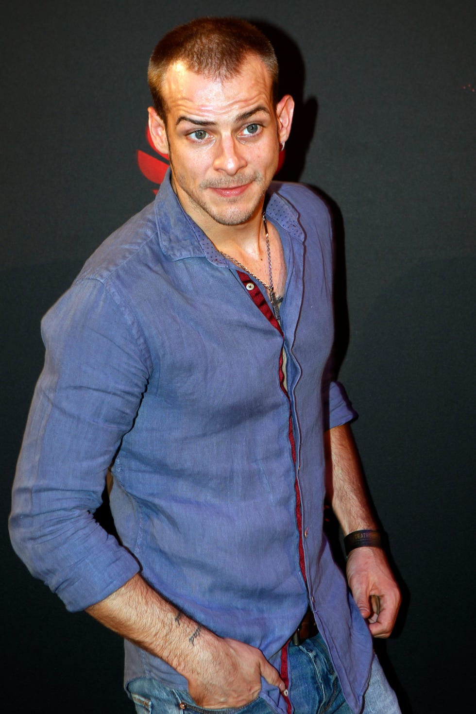 blue, cheek, cool, chin, arm, muscle, human, facial hair, jeans, chest,