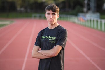 Athlete on a running track wearing a New Balance tshirt