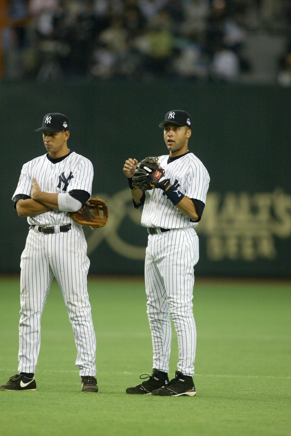New York Yankees Alex Rodriguez and Derek Jeter (R) stand in the infield in  the second inning against the Boston Red Sox at Yankee Stadium in New York  City on September 25