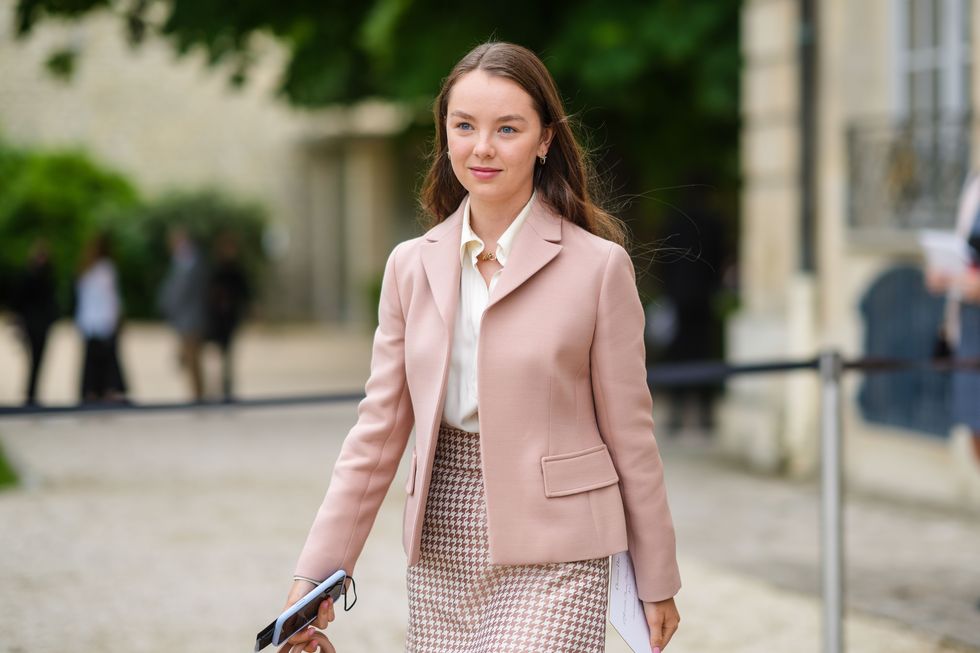 paris, france   july 05 princess alexandra of hanover wears gold earrings, a gold necklace, a white shirt, a pale pink blazer jacket, a pale pink and white houndstooth pattern short skirt, outside dior, during paris fashion week   haute couture fallwinter 20212022, on july 05, 2021 in paris, france photo by edward berthelotgetty images