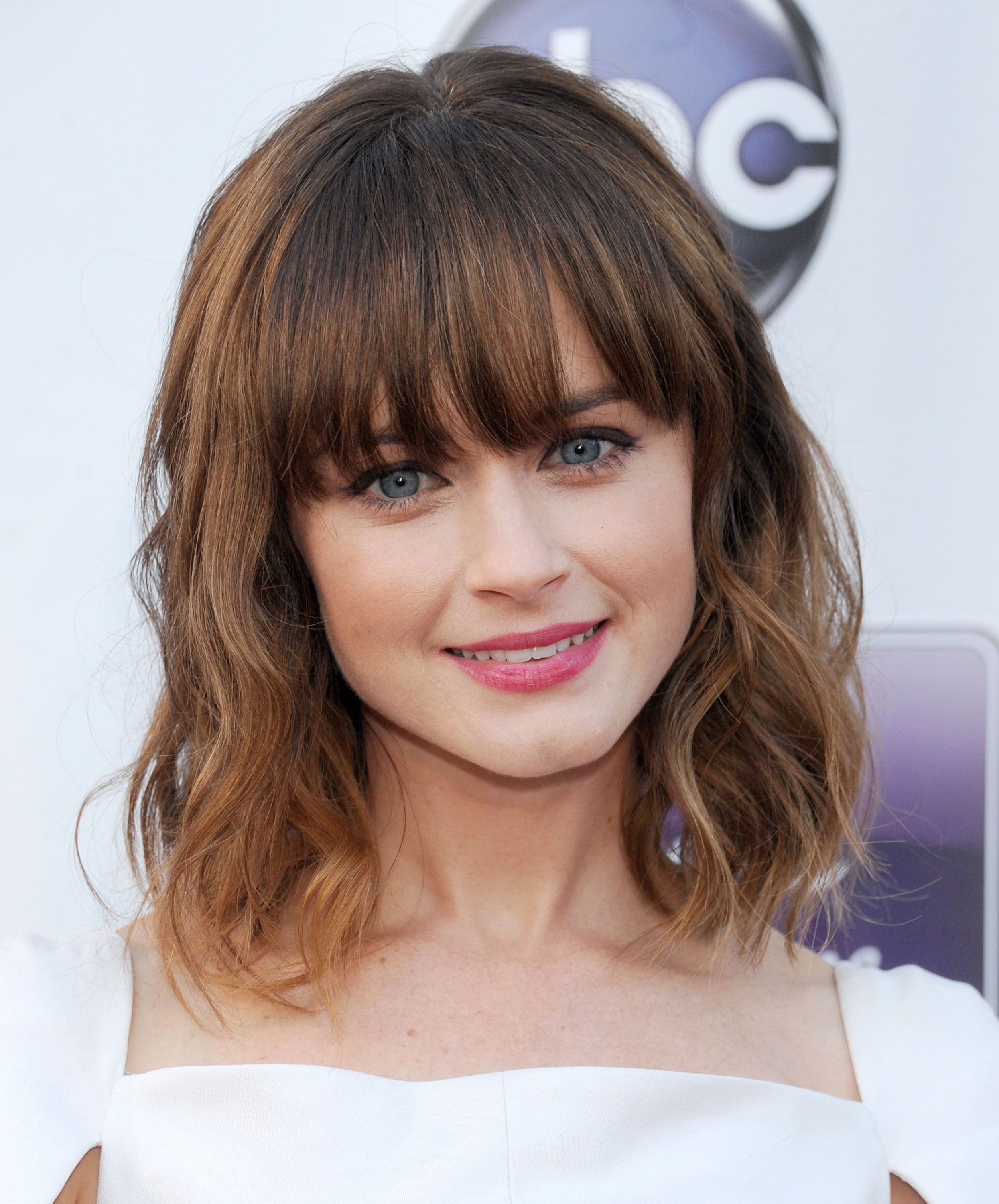 10 Best Medium Length Haircuts With Bangs To Try