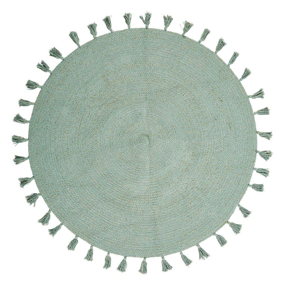 Alfombra verde redonda con borlas