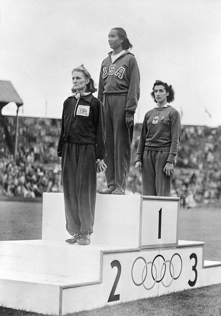 women's olympic winners standing for awards