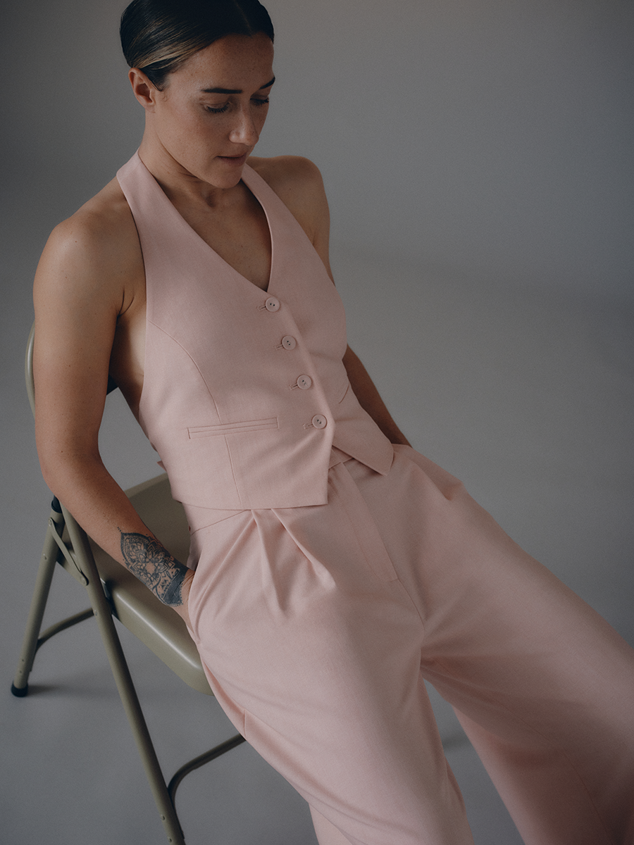 lucy bronze wearing a pink suit from the aligne 2024 spring summer campaign