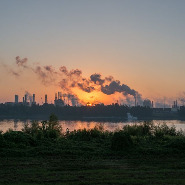 baton rouge, louisiana   october 12 smoke billows from one of many chemical plants in the area october 12, 2013 'cancer alley' is one of the most polluted areas of the united states and lies along the once pristine mississippi river that stretches some 80 miles from new orleans to baton rouge, where a dense concentration of oil refineries, petrochemical plants, and other chemical industries reside alongside suburban homes photo by giles clarkegetty images
