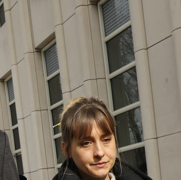 actress allison mack leaves the brooklyn federal courthouse with her lawyers after a court appearance surrounding the alleged sex cult nxivm on february 06, 2019 in new york city