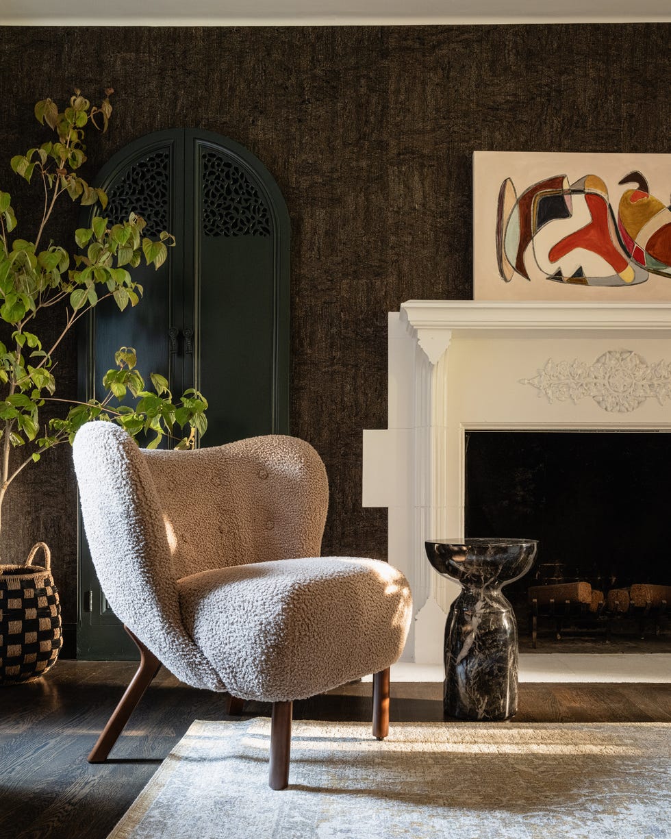 boucle armchair by a mantle