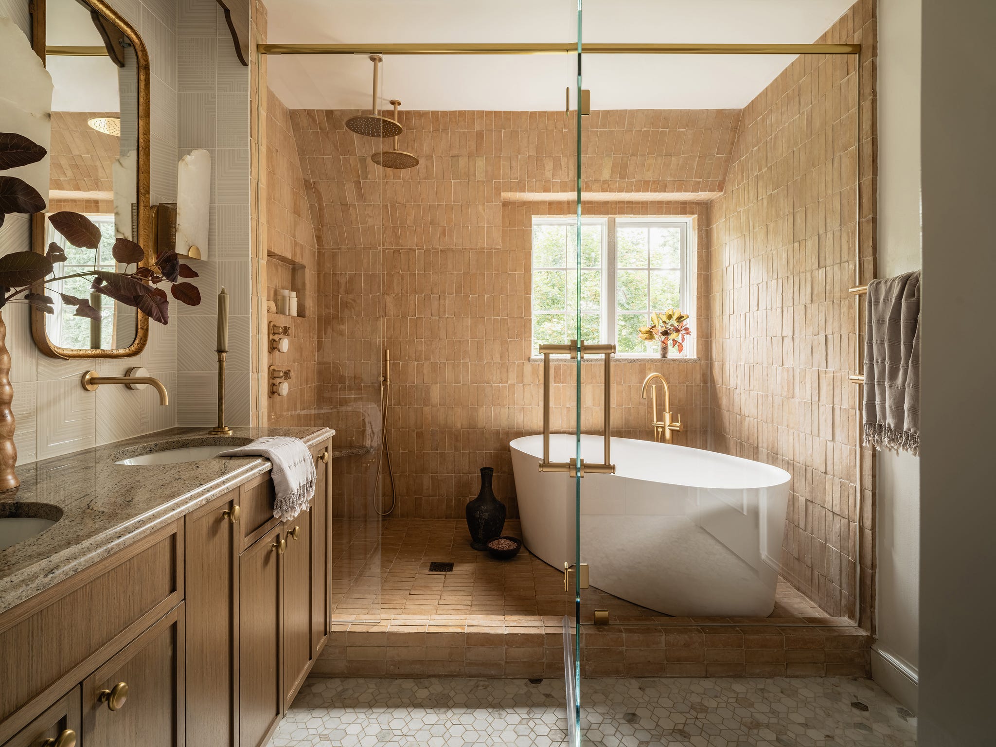 a bathroom with a tub and sink