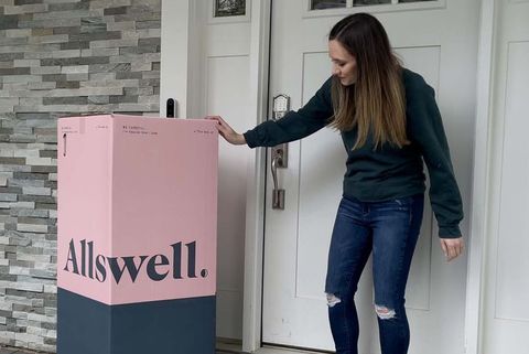 textiles lab executive director lexie sachs with an allswell bed in a box on a porch