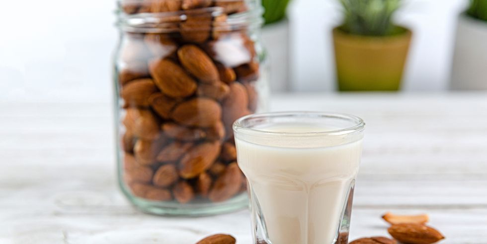 almonds in a jar, a glass of almond milk
